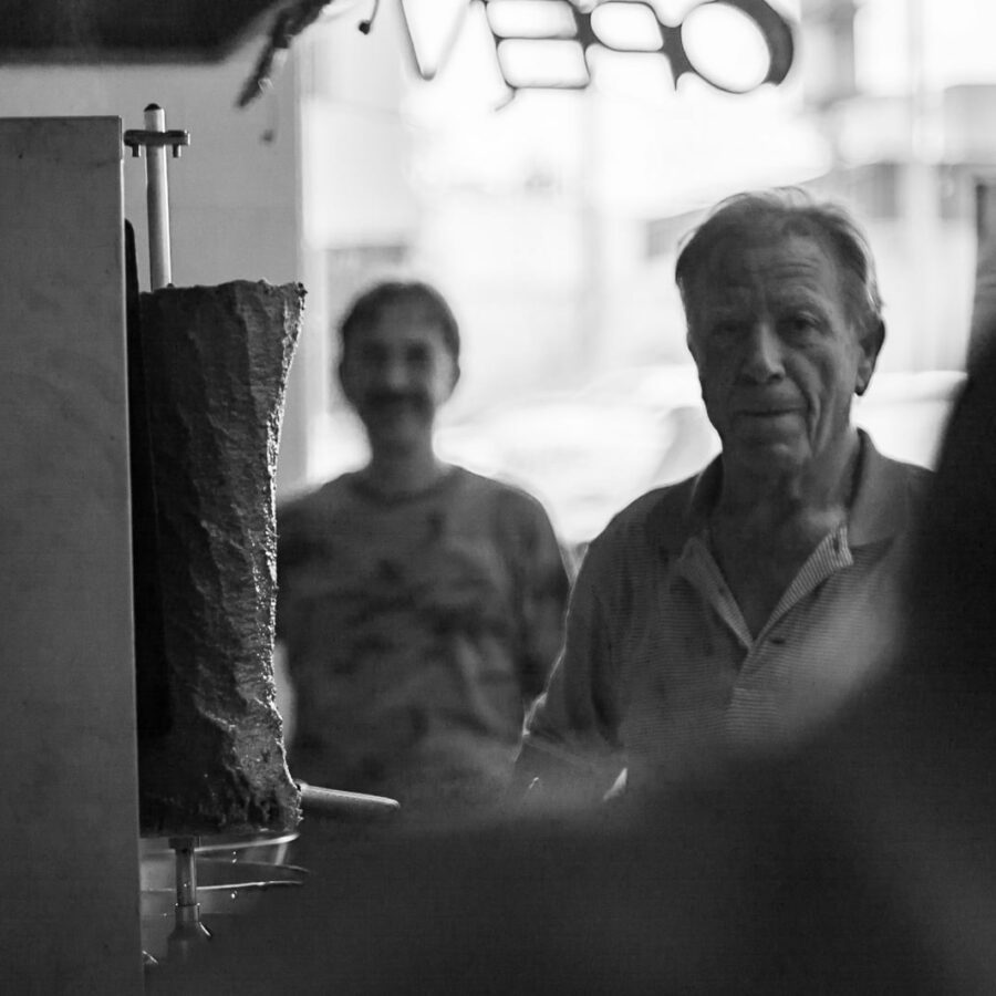 Angelo posing with his knife and steel; unfortunately some bloke stood up and blocked the view just as I opened the shutter — The Greek House