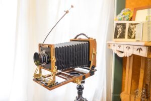 Wista 45DX 4×5 field camera, extended, with Schneider Kreuznach Symmar-S ƒ5.6/150 & Copal No. 0 shutter — OKIE-X (Oklahoma Musicians on X-ray Film)