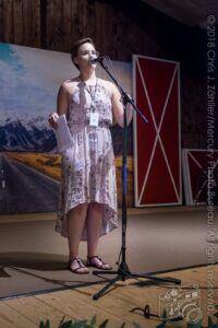 Emcee Cattie Lesley Introduces Gypsy Twang — 21st Annual Woody Guthrie Festival, 2018