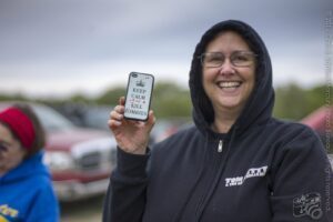 Bruce's Wife Shows His iPhone (Keep Calm and Kill Zombies) — Oklahoma’s Premier Zombie Race: Zombie Bolt 5K, Guthrie, Oklahoma