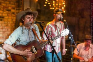 Sam, Riley, & Special Guest Douglas Francisco (I) — Sam Doores + Riley Downing & the Tumbleweeds at the Brick Café, Woody Guthrie Folk Festival 16