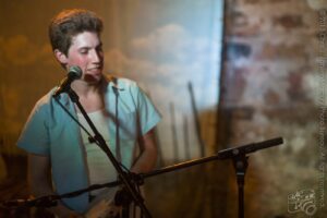 Cameron (Tambourine) — Sam Doores + Riley Downing & the Tumbleweeds at the Brick Café, Woody Guthrie Folk Festival 16