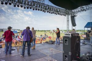 Lori Holyfield & Oklahoma Geniuses upstage view — 17th Annual Woody Guthrie Folk Festival, 2014