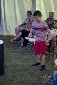 Kaden (Dancing Kid in Audience). Kaden is D. J. Burrup's grandson. — 22nd Annual Woody Guthrie Festival, 2019