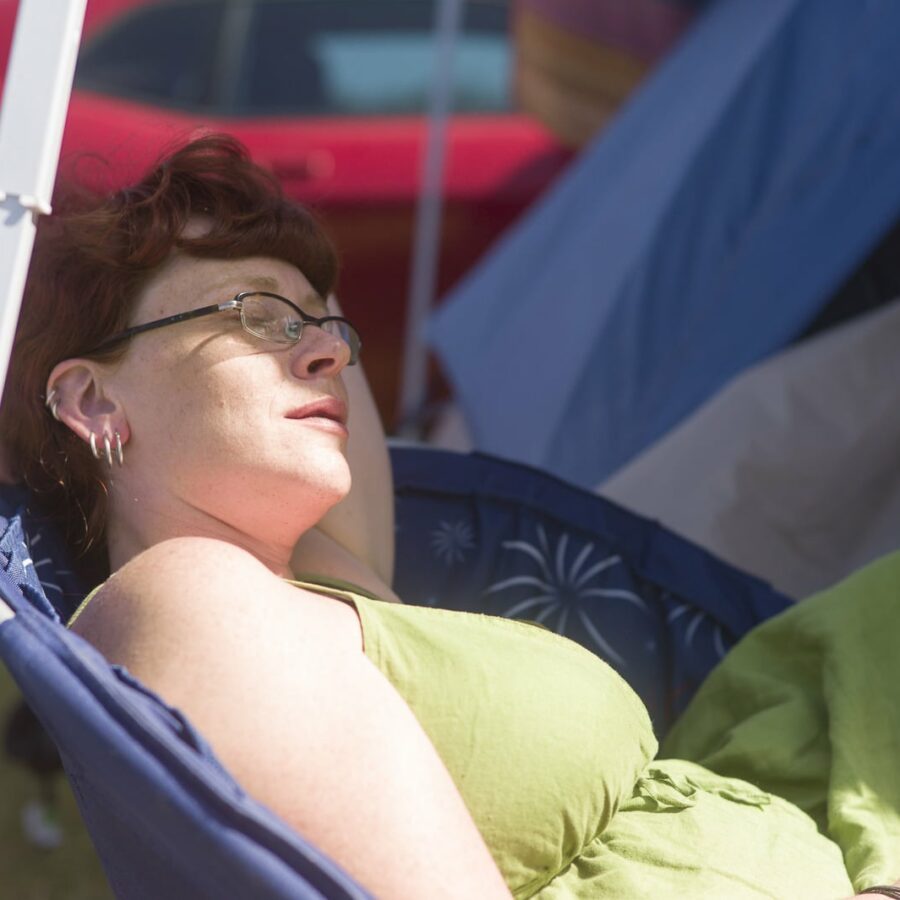 Lisa Davis napping at Band Camp — 17th Annual Woody Guthrie Folk Festival, 2014